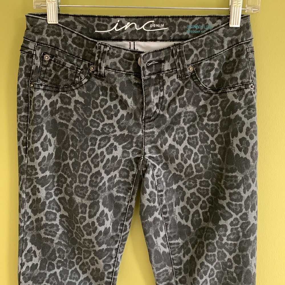 INC animal print stretch skinny jeans.